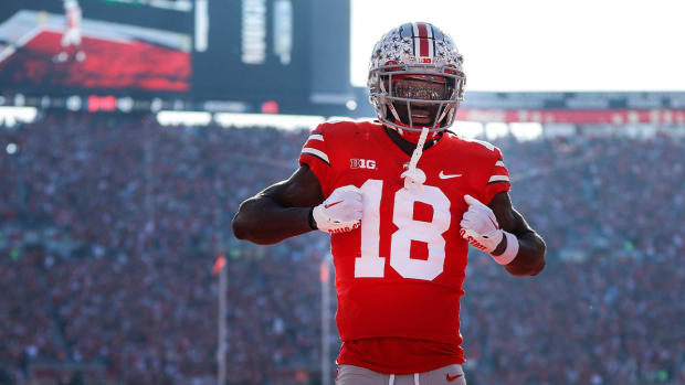 Ohio State wide receiver Marvin Harrison Jr. (18) celebrates a touchdown against Michigan during the first half at Ohio Stadium in Columbus on Nov. 26, 2022.
